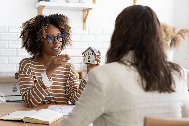 women are negotiating sale, deal. concept of real estate transaction, buying real estate renting apartment